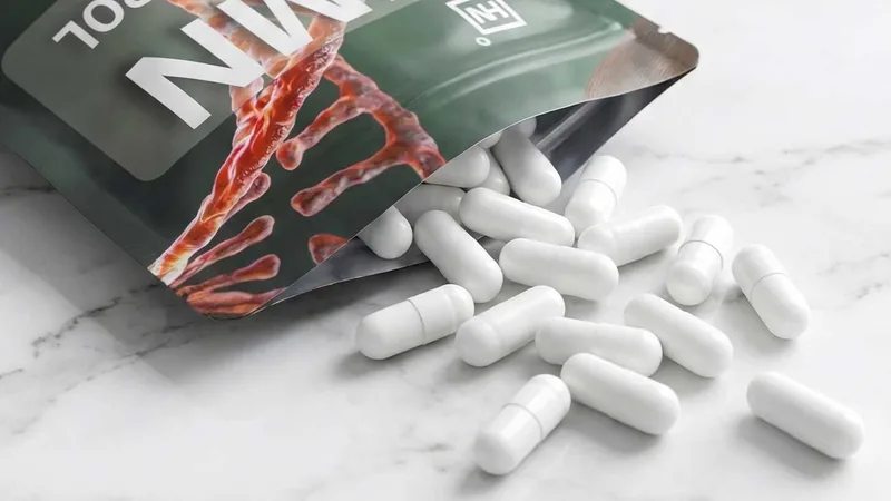 NMN capsules arranged on a clean surface — complete dosage guide